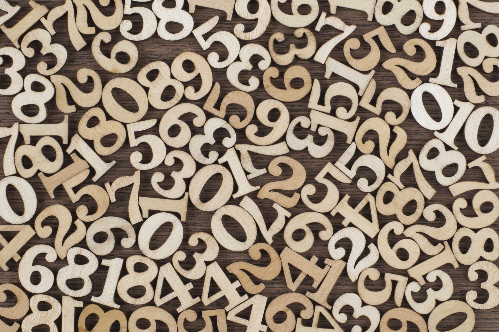 Wooden numbers on black background