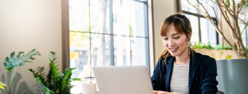 Professional freelancer working at laptop