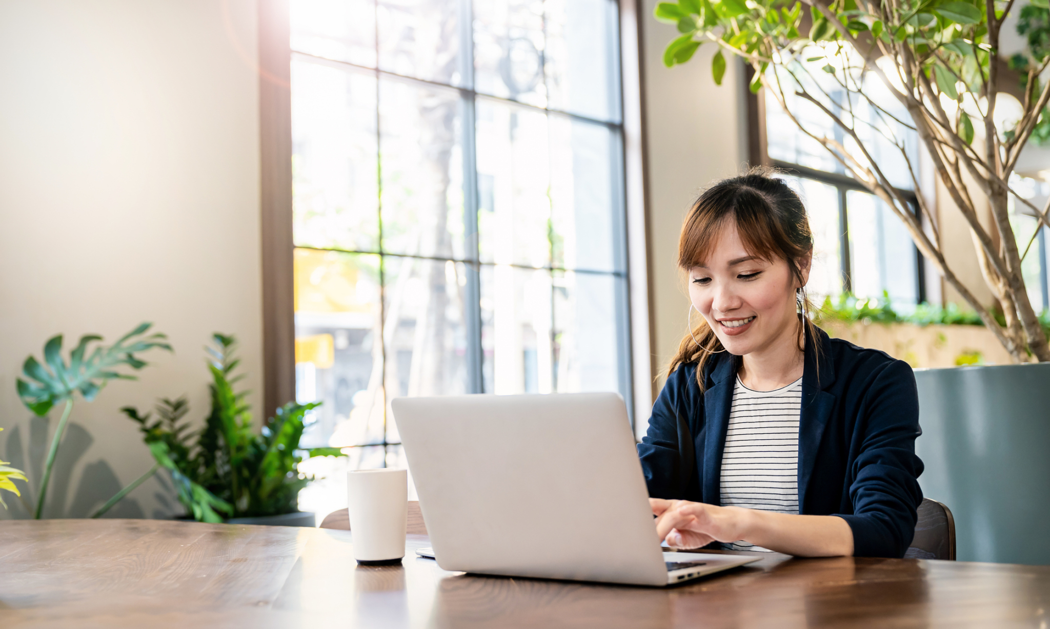 Professional freelancer working at laptop
